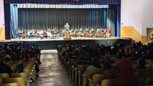 Cropped WMS Auditorium with concert on stage