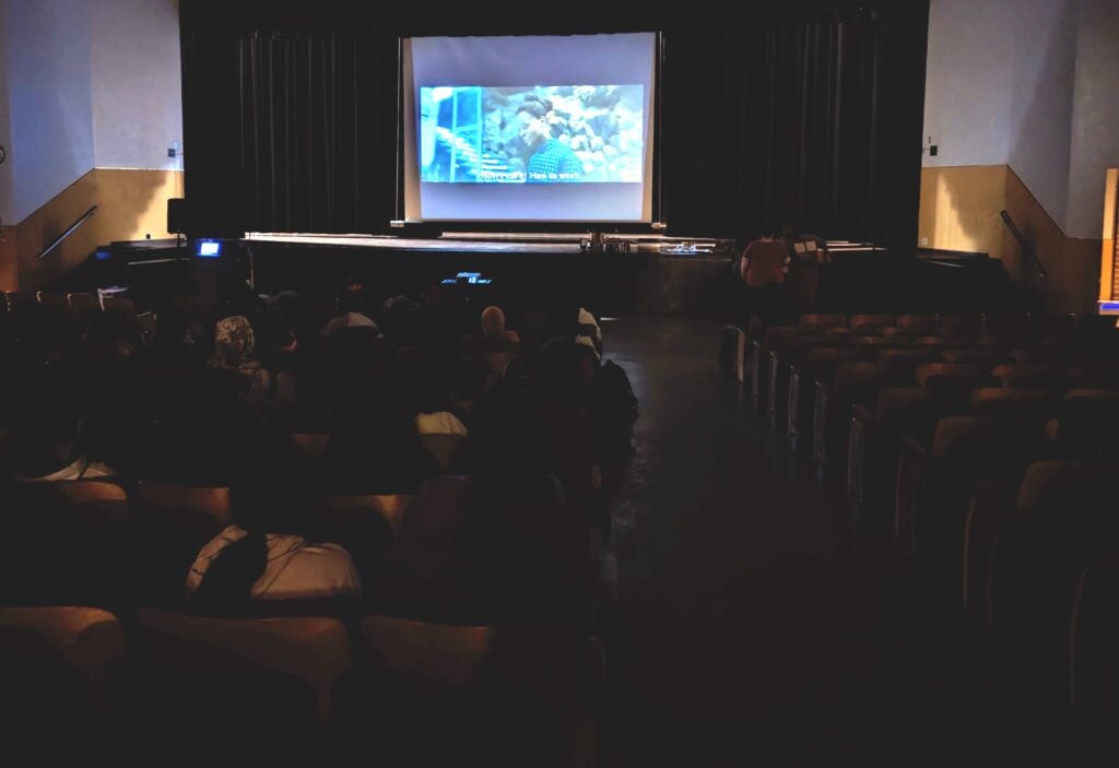 WMS Auditorium students watching Wakanda Forever